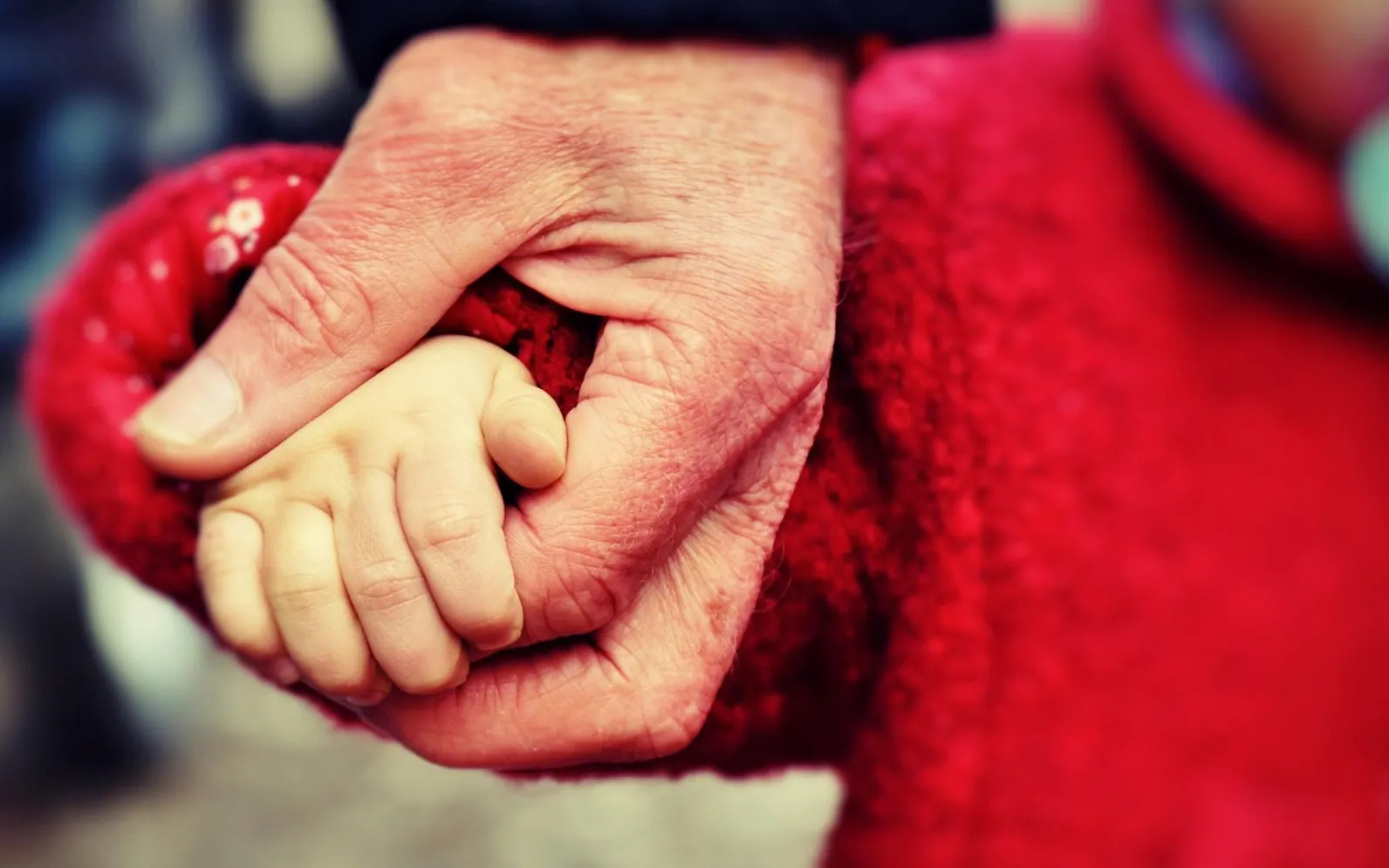Infant, hand and small child