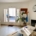 Bright, tidy office workspace with a desk and indoor plants